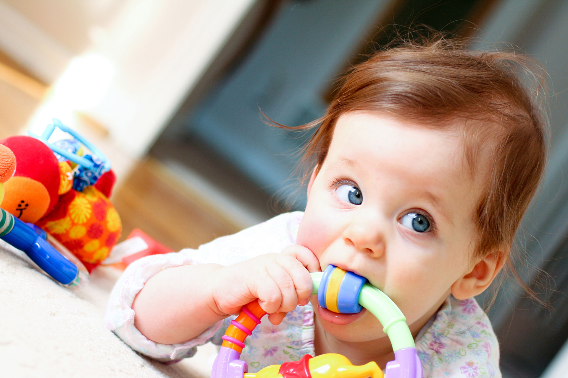 baby chewing on toy – 6